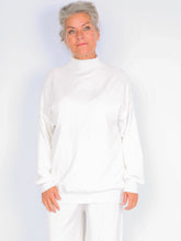 Knitted sweater with high neck